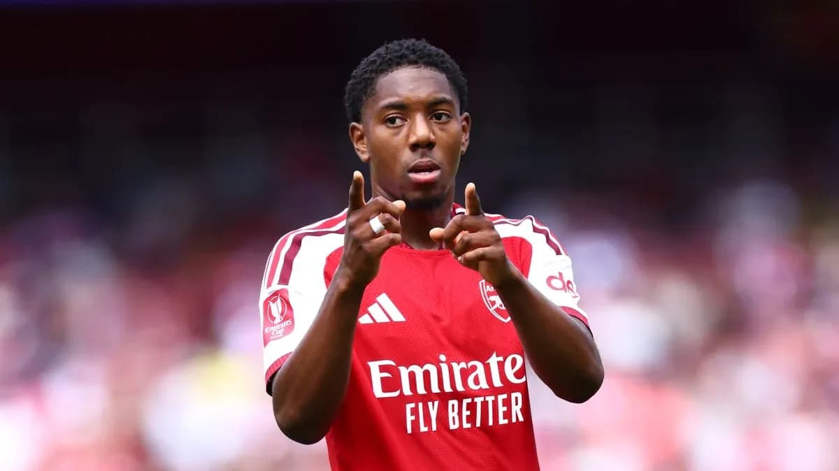 Player celebrating with fingers pointed during match Player celebrating with fingers pointed during match