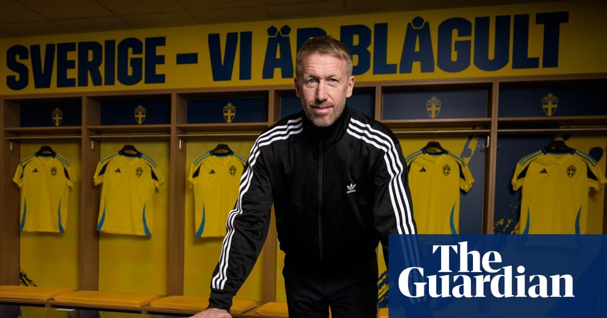 Coach posing in locker room with Swedish jerseys Coach posing in locker room with Swedish jerseys