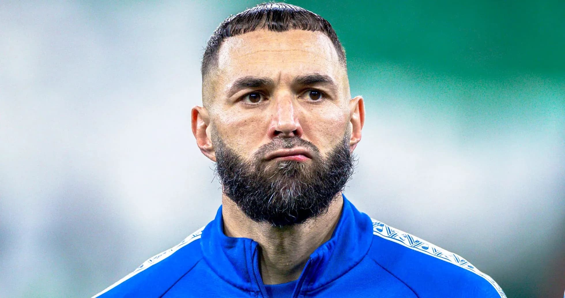 Player in blue training kit with beard and short hair Player in blue training kit with beard and short hair