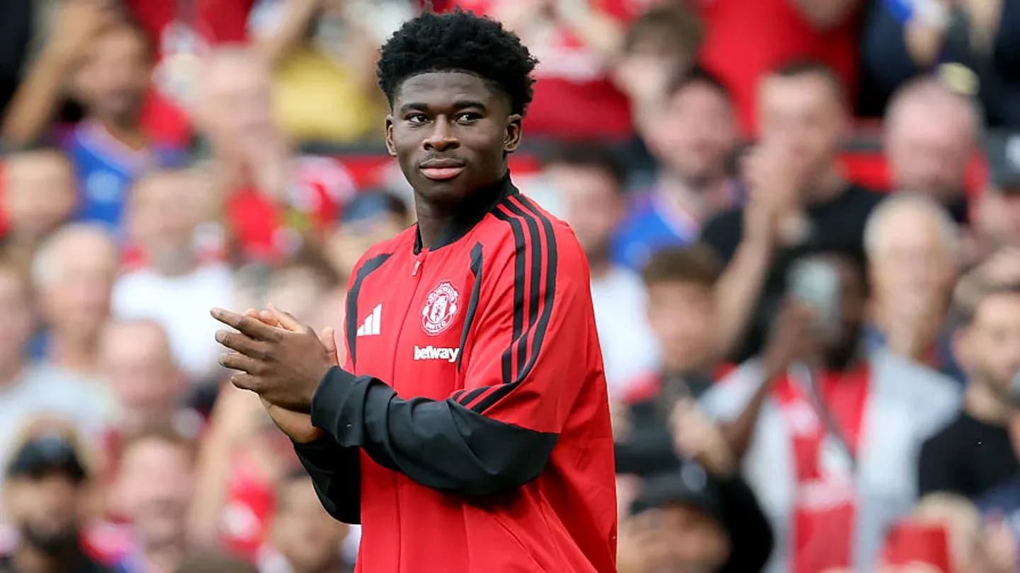 Player applauding during Manchester United match warm-up Player applauding during Manchester United match warm-up