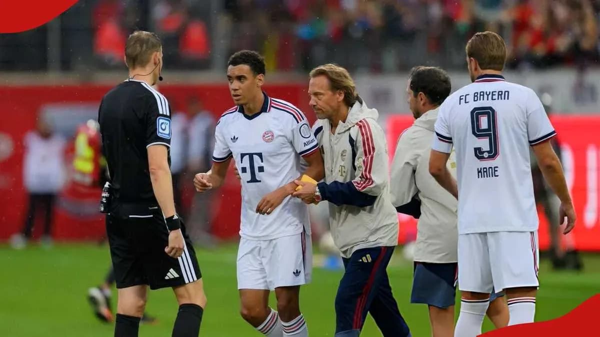 Bayern Munich players interacting with referee during match Bayern Munich players interacting with referee during match