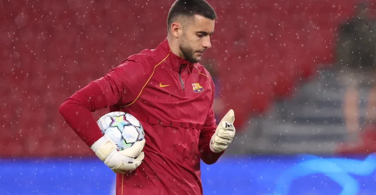Goalkeeper in red jersey holding a soccer ball Goalkeeper in red jersey holding a soccer ball