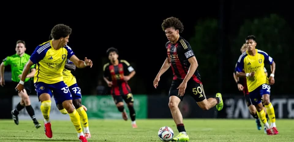 Atlanta United II player dribbling past Orlando City II Atlanta United II player dribbling past Orlando City II