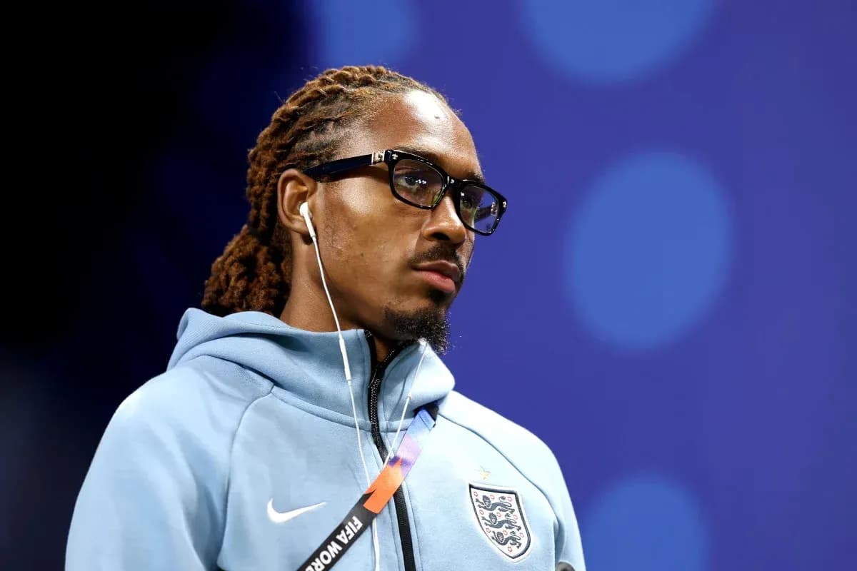 Player wearing glasses and headphones in team hoodie Player wearing glasses and headphones in team hoodie