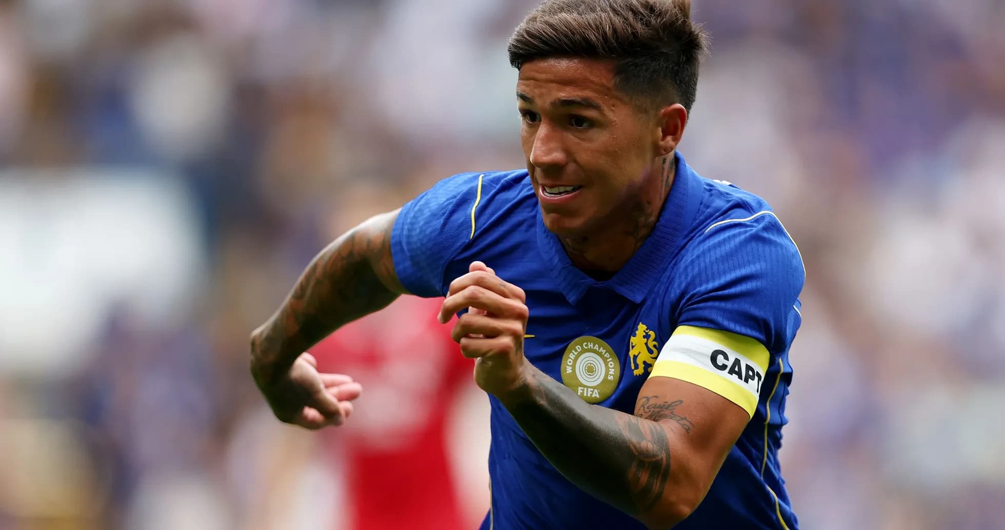 Player in blue jersey sprinting during match Player in blue jersey sprinting during match