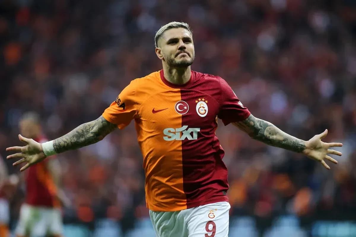 Player celebrating goal in Galatasaray jersey Player celebrating goal in Galatasaray jersey