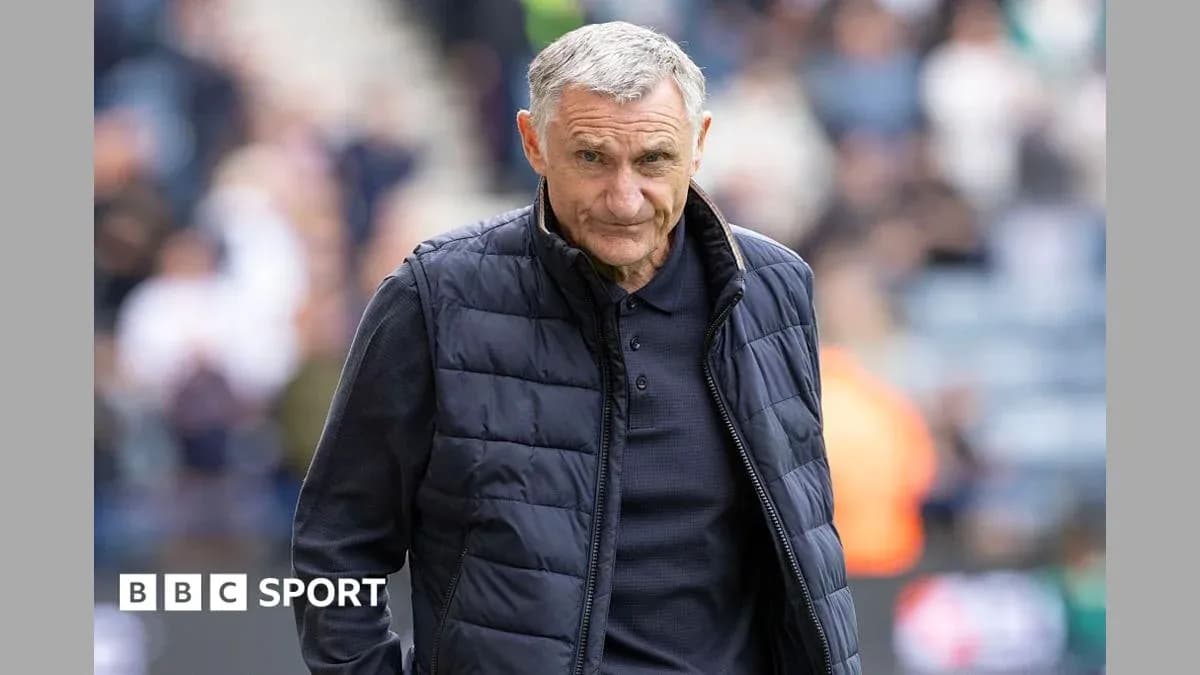Manager walking on the pitch during match Manager walking on the pitch during match