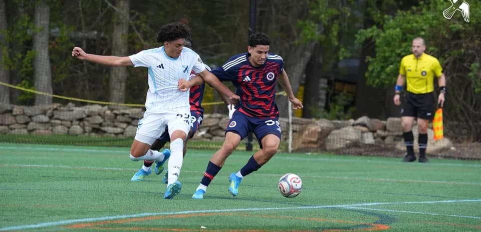Players competing for the ball in MLS Next Pro Players competing for the ball in MLS Next Pro