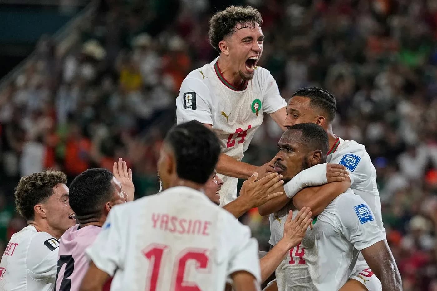 Morocco players celebrating a goal during match Morocco players celebrating a goal during match