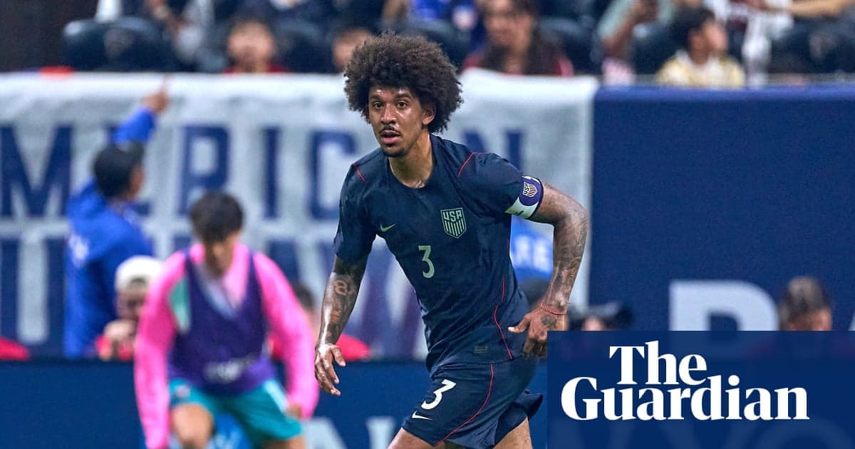 Player in USA kit running on the field Player in USA kit running on the field