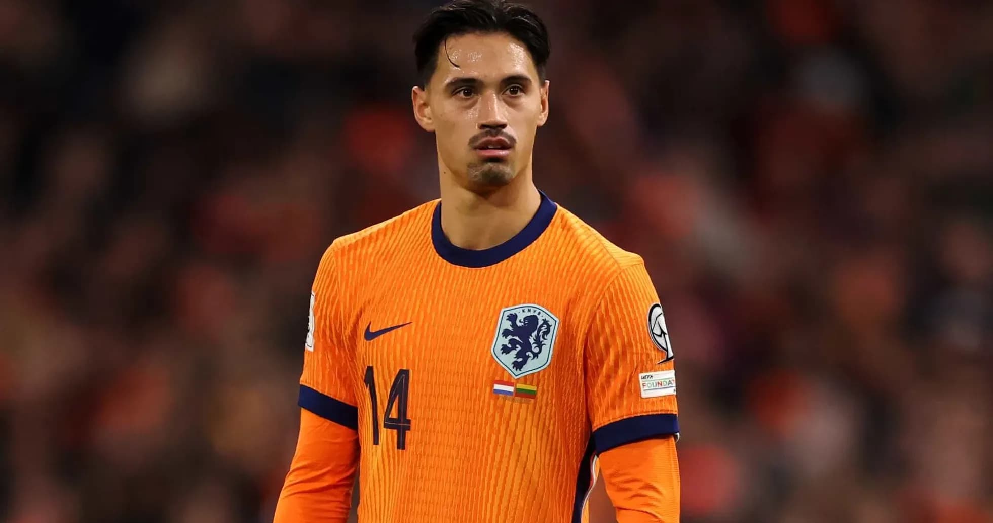 Player in orange Netherlands kit during match Player in orange Netherlands kit during match