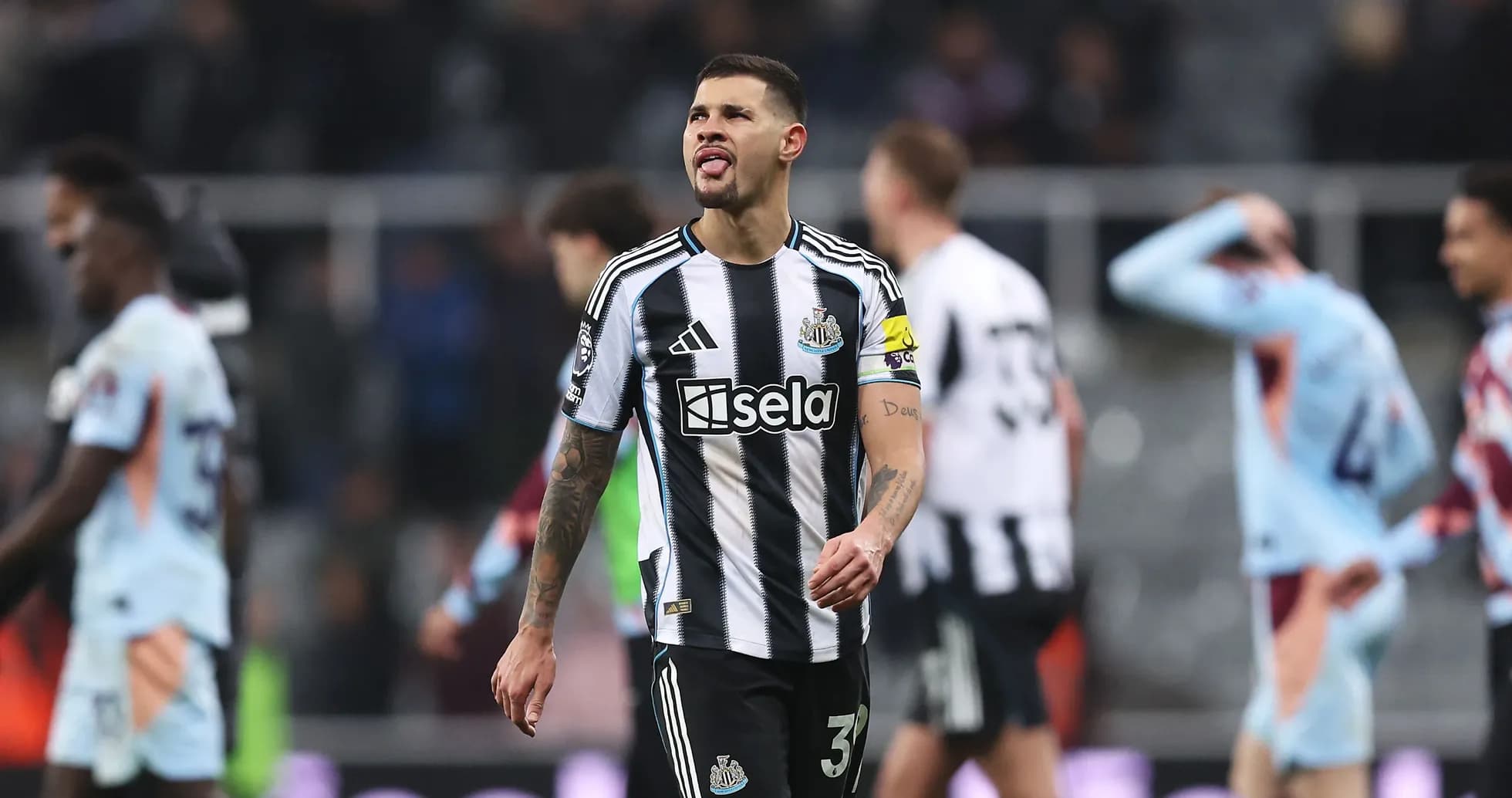 Newcastle player walking off field after match Newcastle player walking off field after match