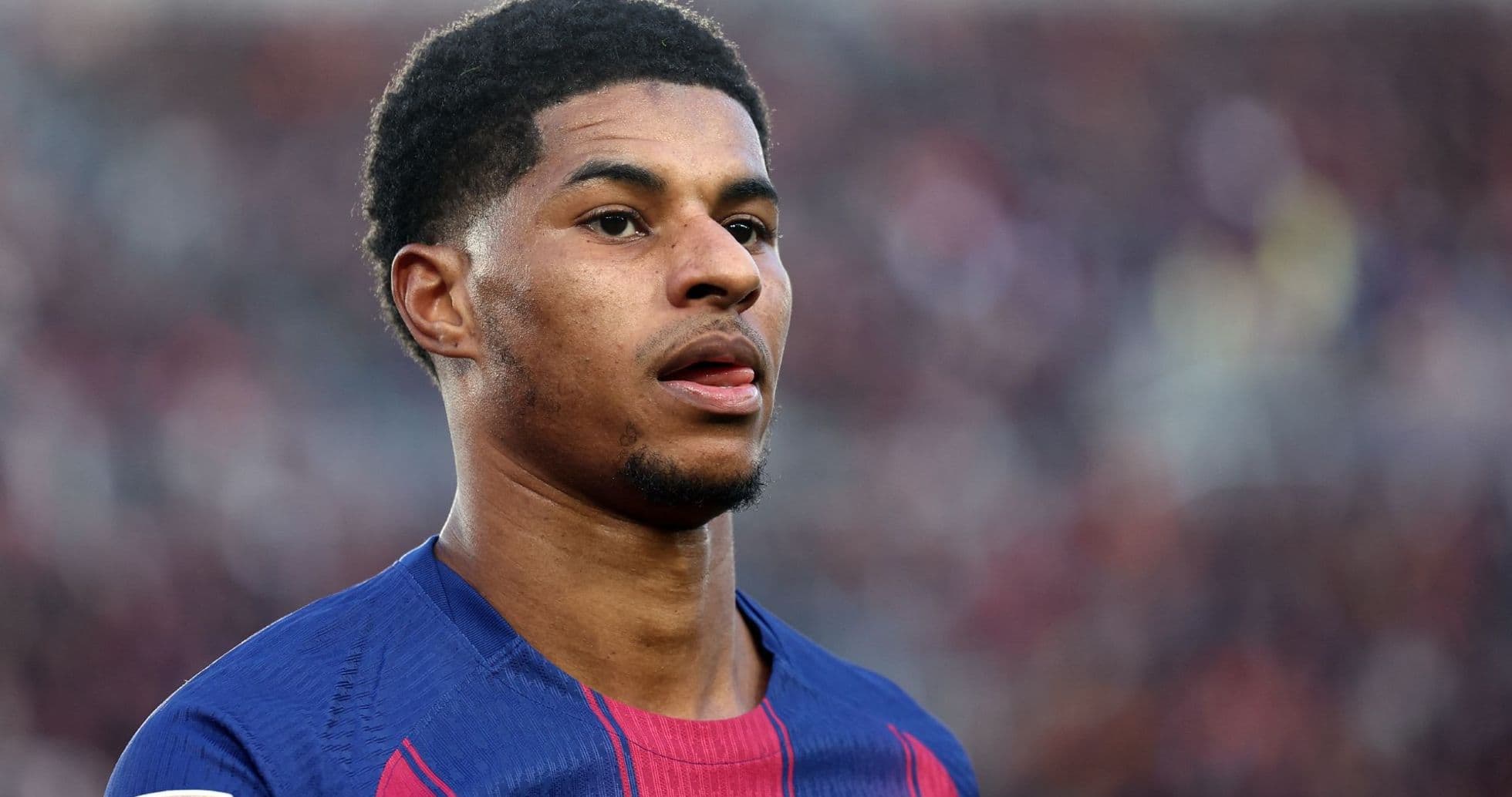 Football player in Barcelona kit on the pitch Football player in Barcelona kit on the pitch