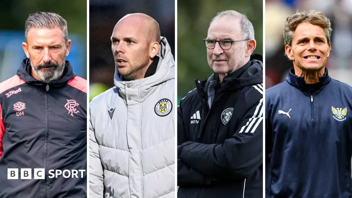 Four football managers standing side by side Four football managers standing side by side