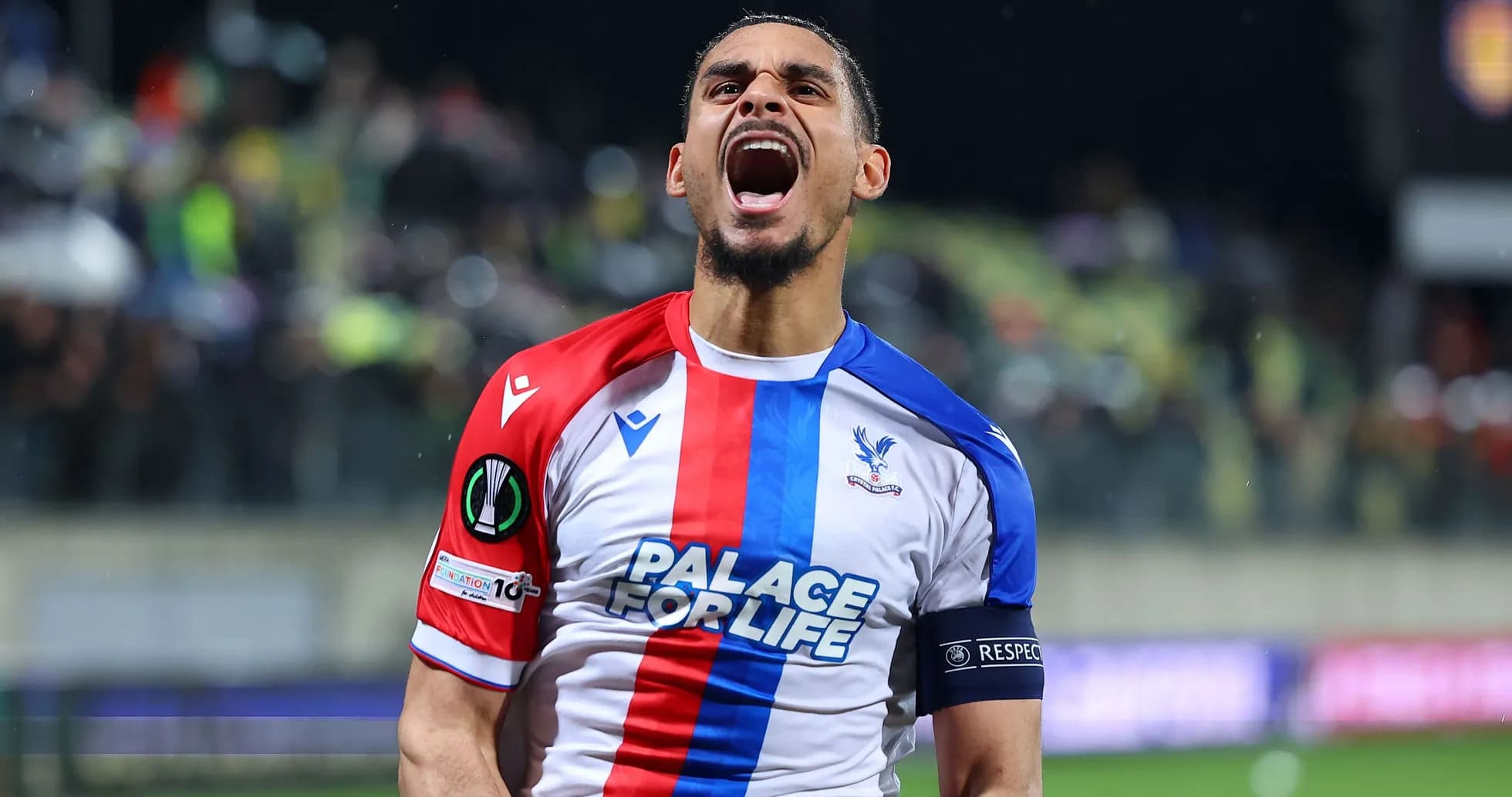 Player celebrating after scoring a goal for Crystal Palace Player celebrating after scoring a goal for Crystal Palace