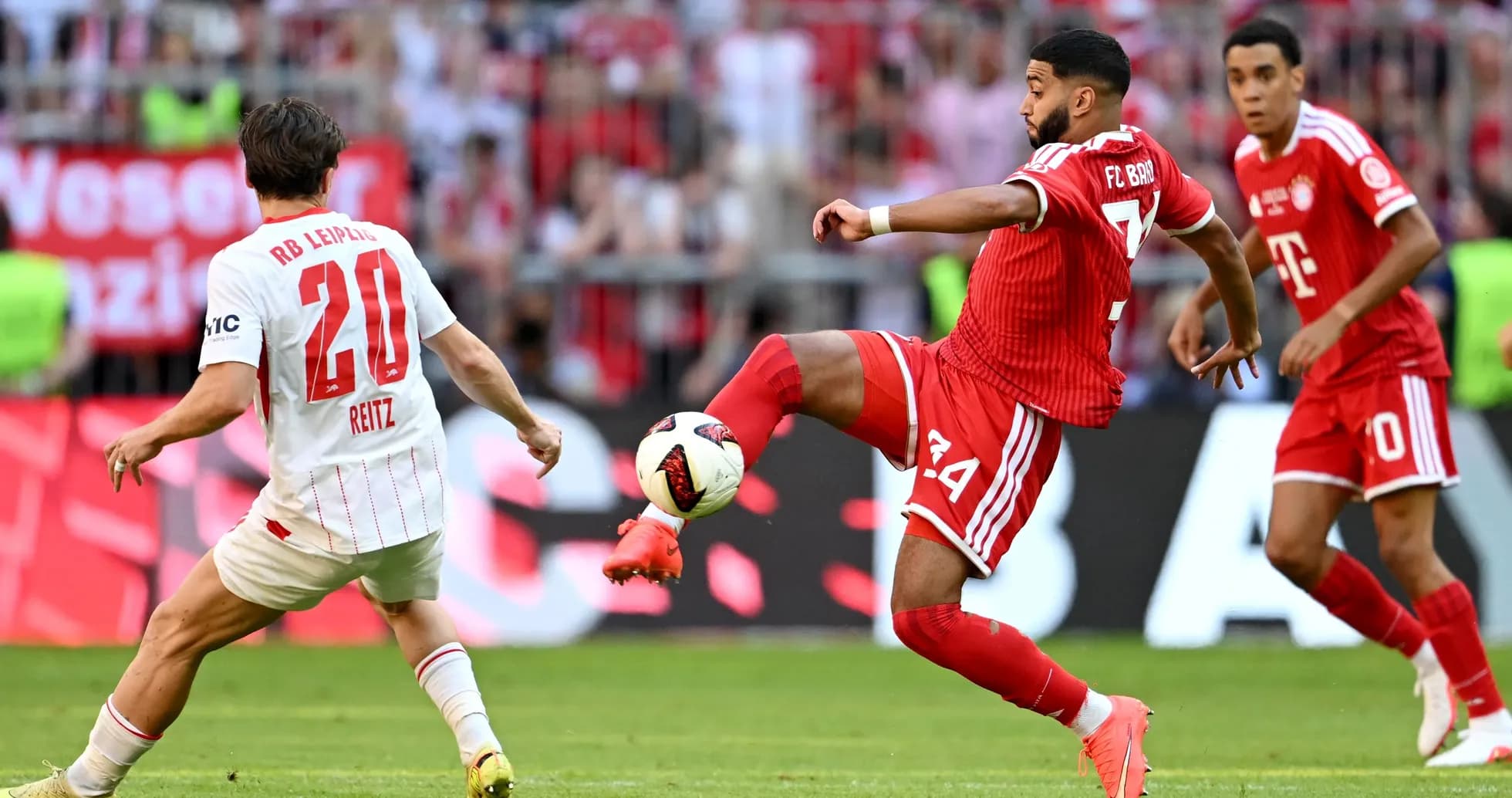 Player from Bayern Munich kicking the ball during match Player from Bayern Munich kicking the ball during match