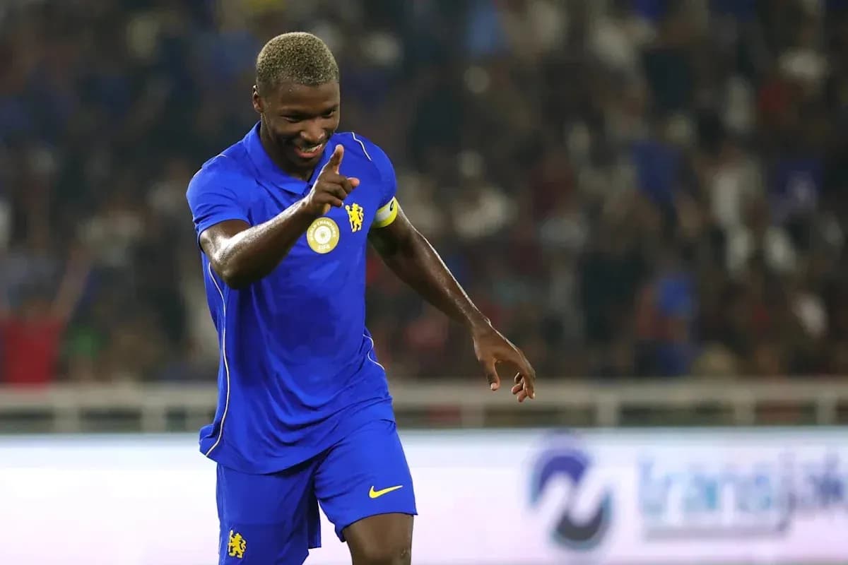 Player celebrating with a finger raised during match Player celebrating with a finger raised during match