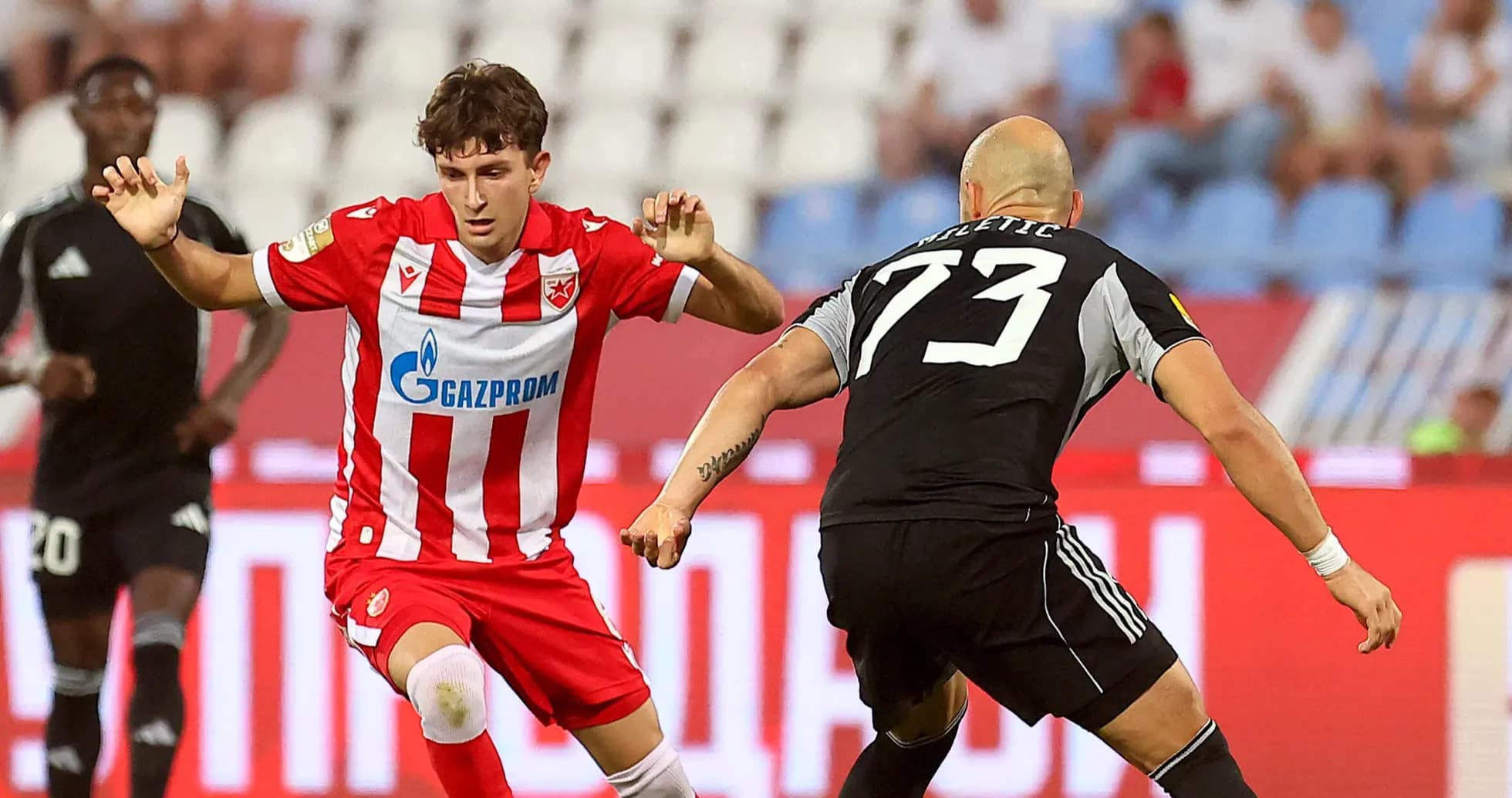 Player from FK Crvena Zvezda in action Player from FK Crvena Zvezda in action