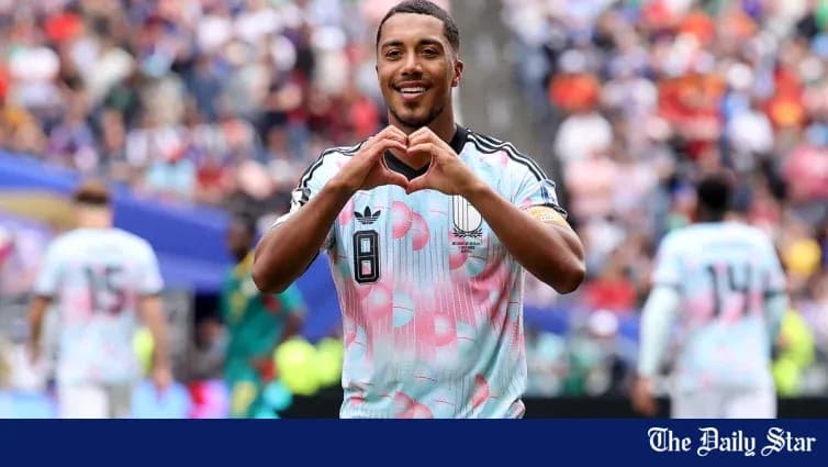 Player celebrating by making a heart gesture Player celebrating by making a heart gesture