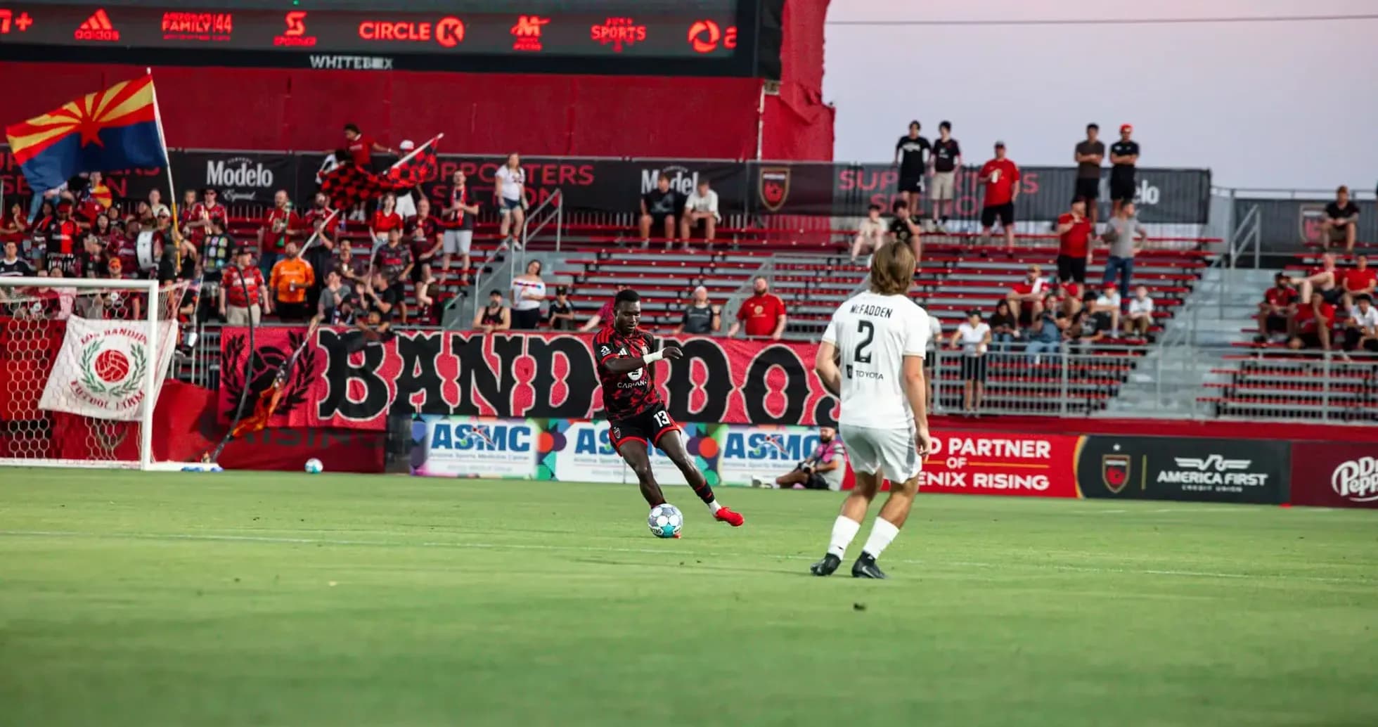 Player kicking ball during Phoenix Rising match Player kicking ball during Phoenix Rising match