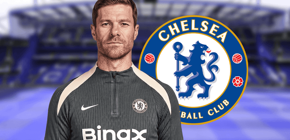 Coach in Chelsea training kit with club logo Coach in Chelsea training kit with club logo