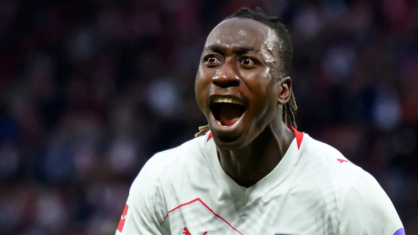 Player celebrating a goal during a match Player celebrating a goal during a match