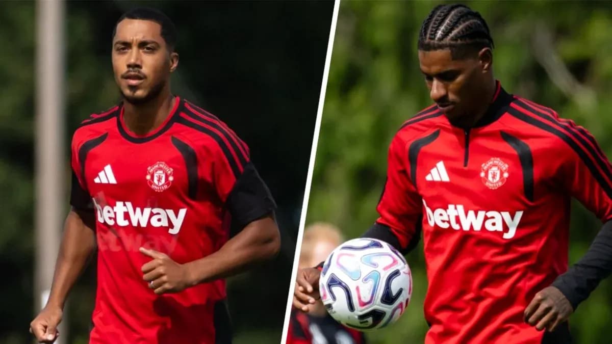 Two Manchester United players training in red jerseys Two Manchester United players training in red jerseys