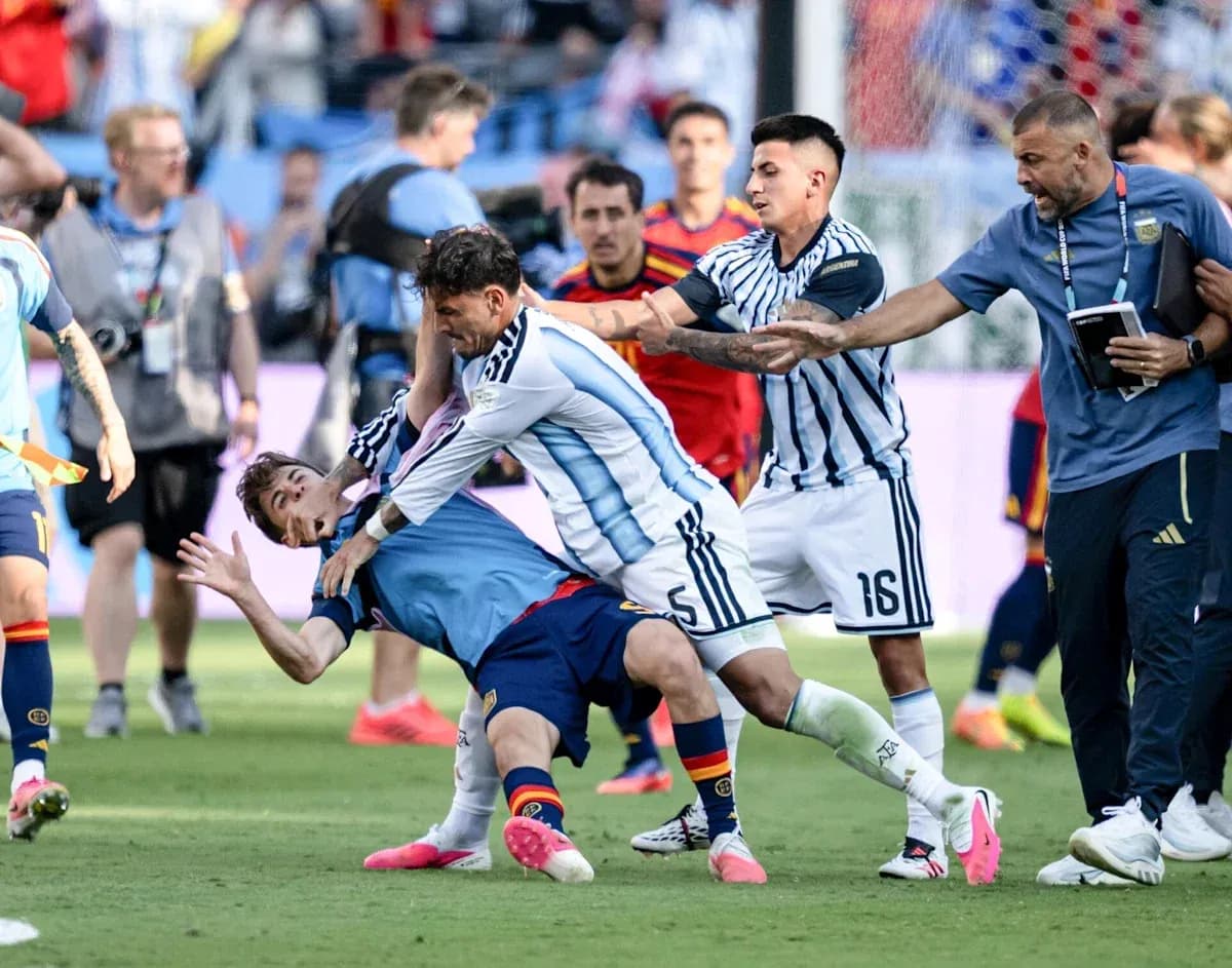Players from Argentina and Spain in a scuffle Players from Argentina and Spain in a scuffle
