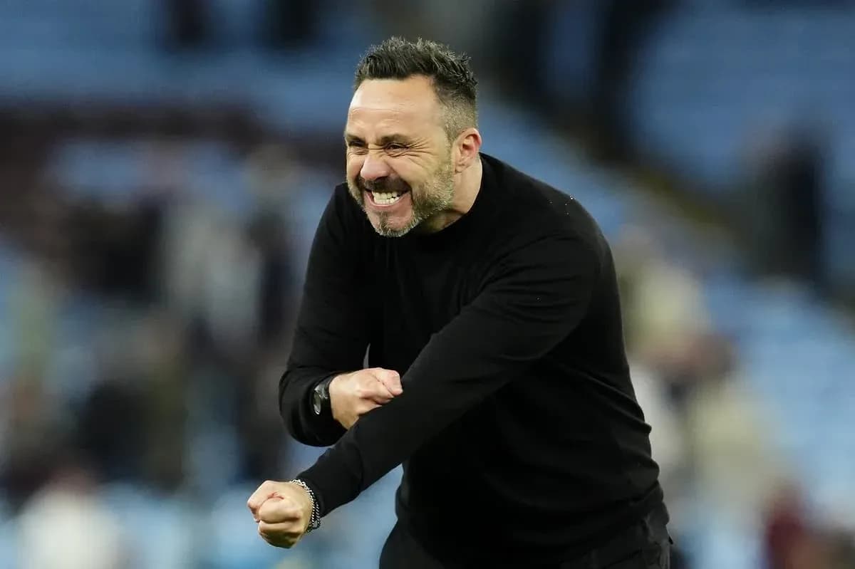 Coach celebrating passionately on the sidelines Coach celebrating passionately on the sidelines