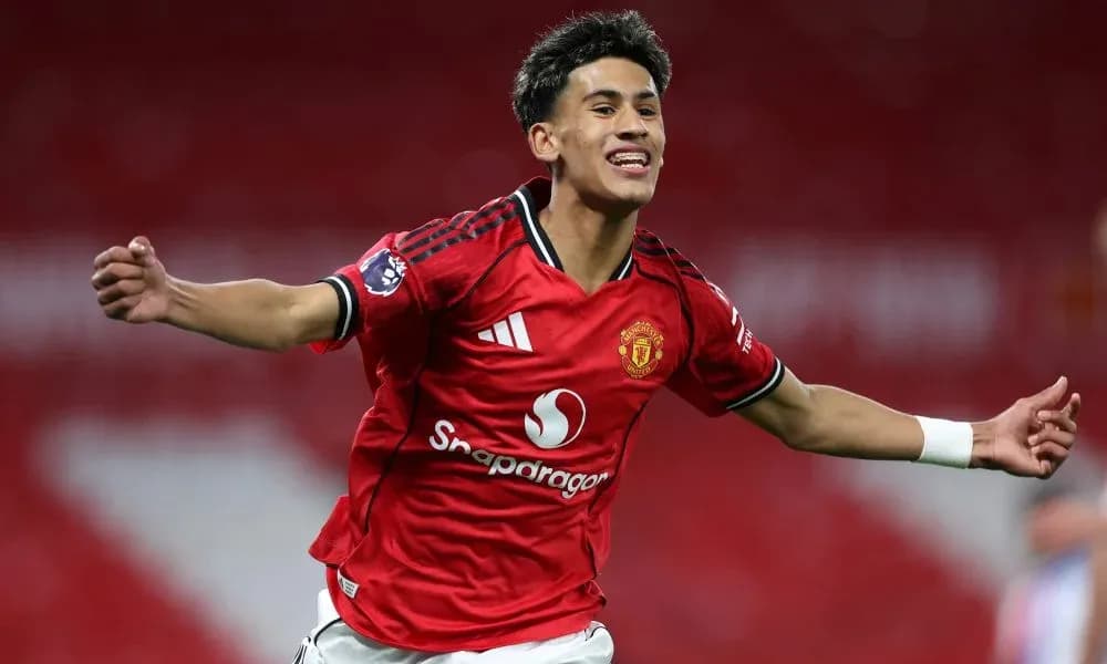 Player celebrating after scoring a goal for Manchester United Player celebrating after scoring a goal for Manchester United