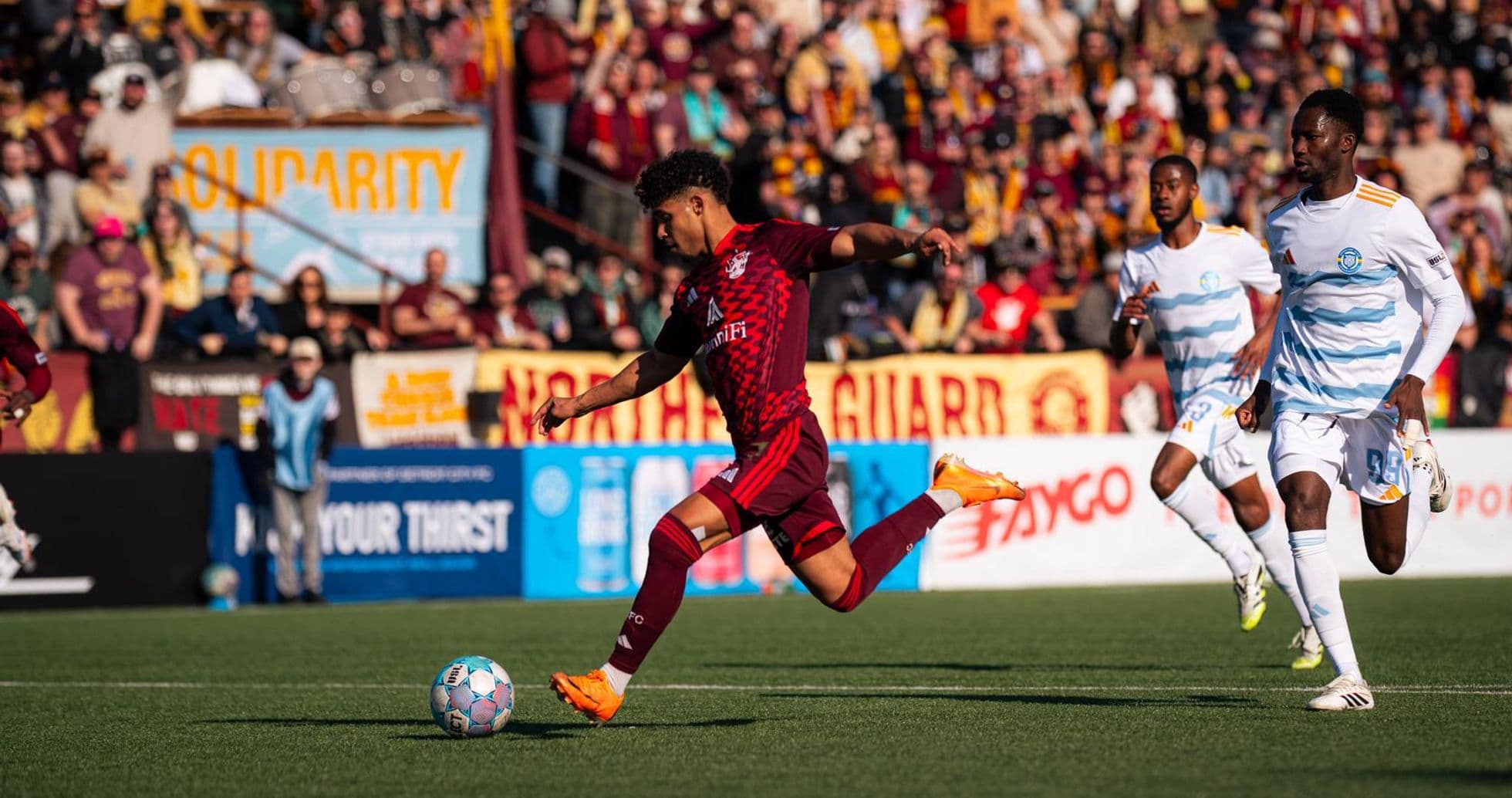 Player kicking ball during Phoenix Rising match Player kicking ball during Phoenix Rising match