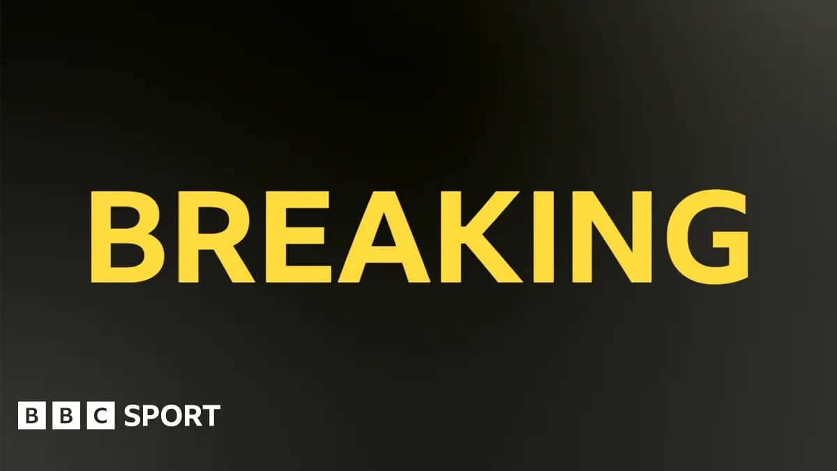 Breaking news announcement in bold yellow text Breaking news announcement in bold yellow text