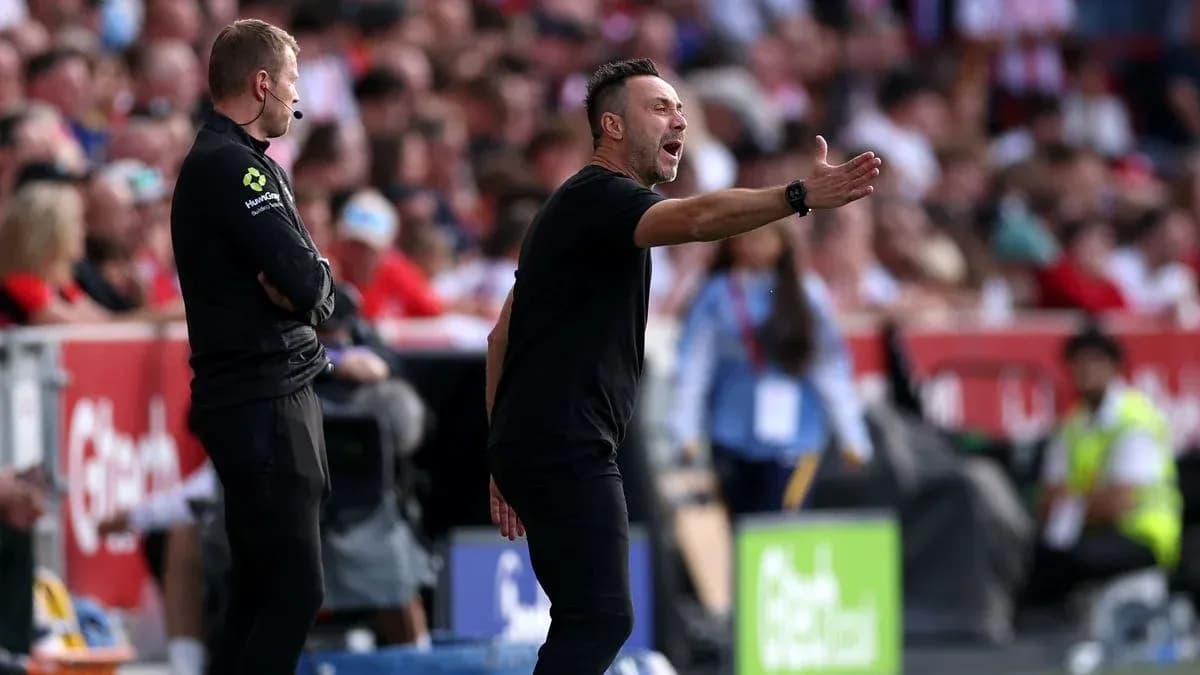 Coach gesturing during match from sideline Coach gesturing during match from sideline