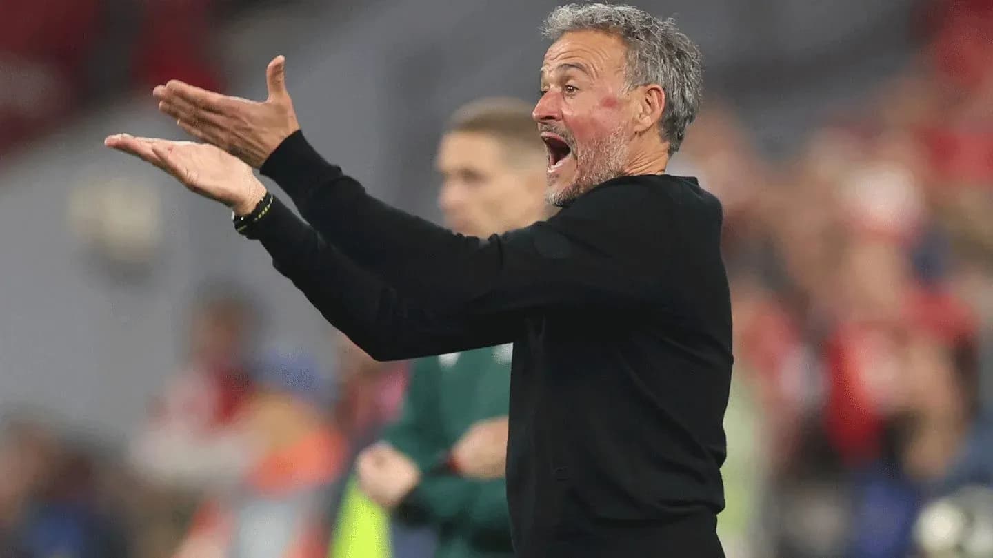 Coach gesturing during a match on the sidelines Coach gesturing during a match on the sidelines
