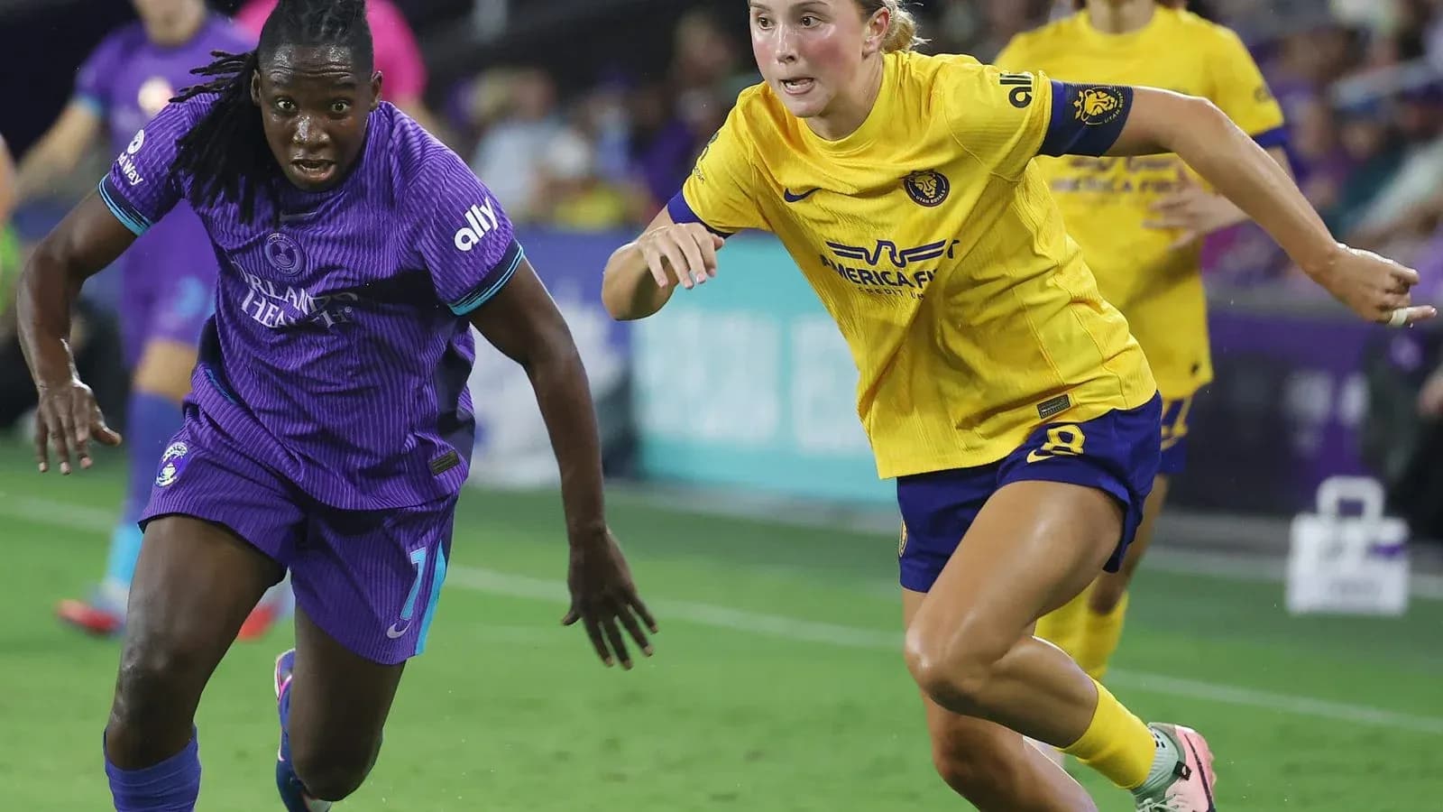 Orlando Pride player chasing Houston Dash opponent Orlando Pride player chasing Houston Dash opponent