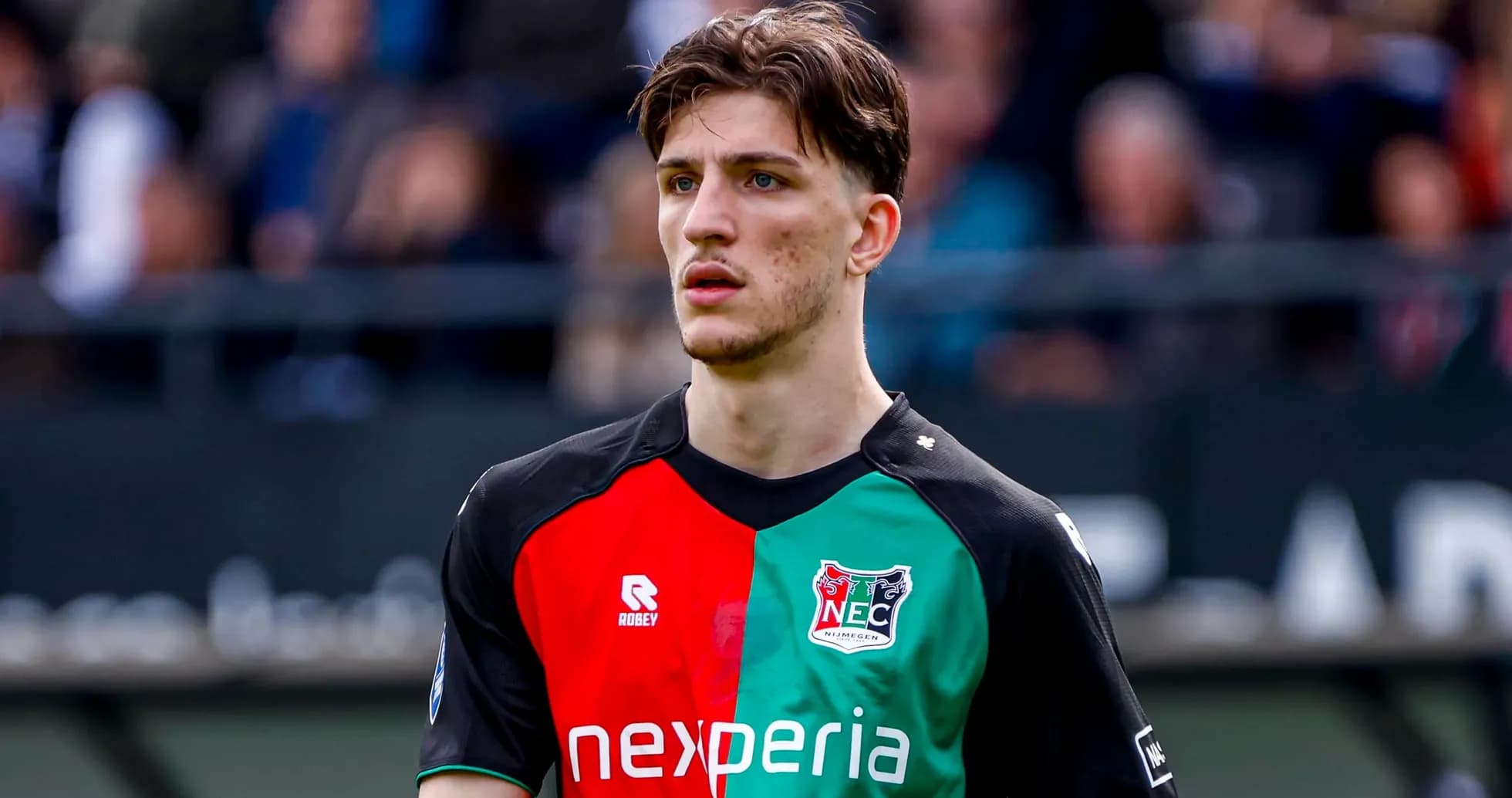Player in NEC Nijmegen jersey on the pitch Player in NEC Nijmegen jersey on the pitch