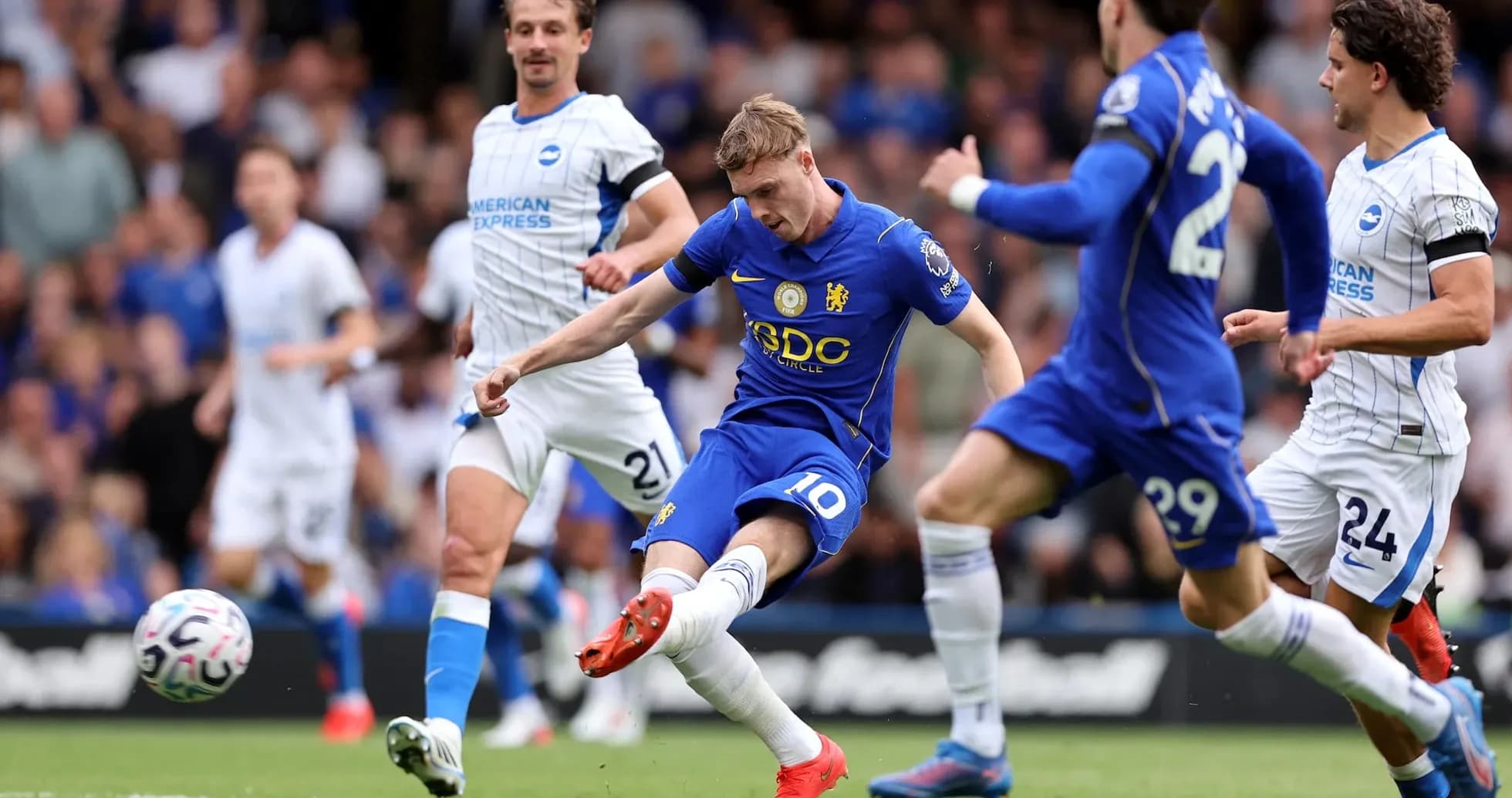 Chelsea player taking a shot on goal Chelsea player taking a shot on goal