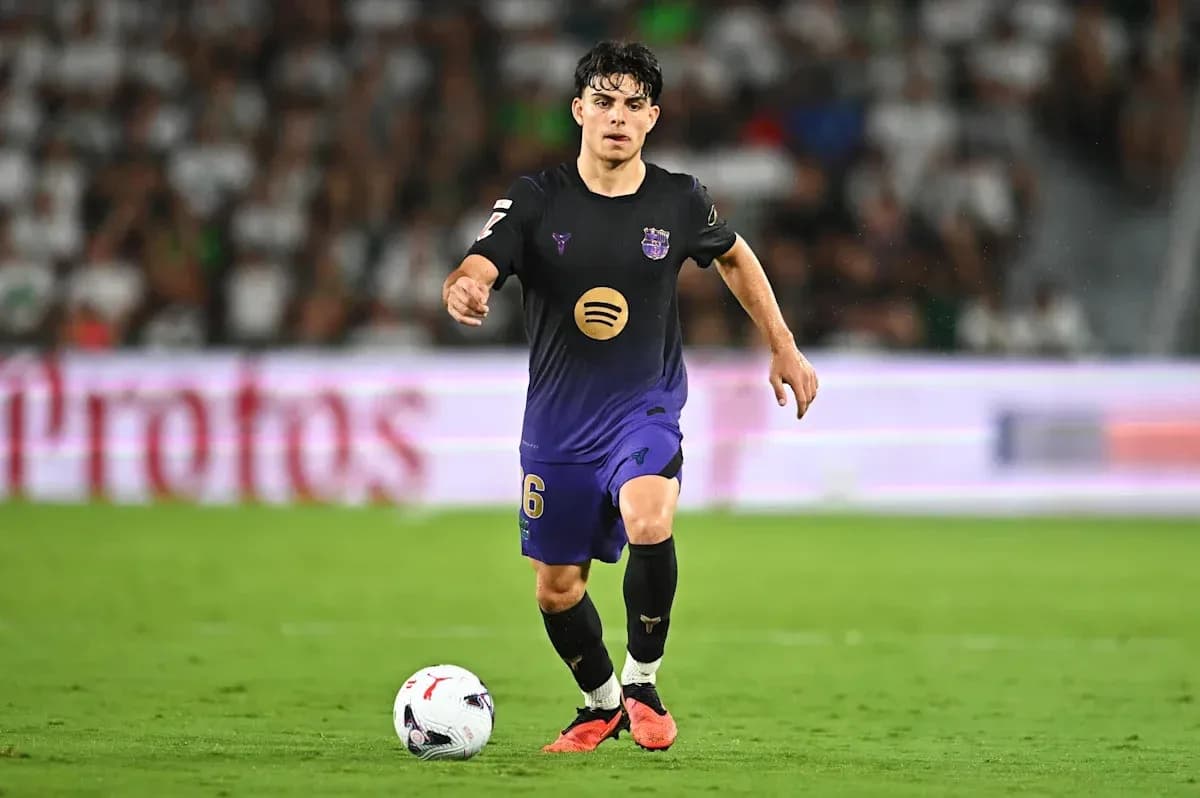 Player dribbling the ball during a match Player dribbling the ball during a match