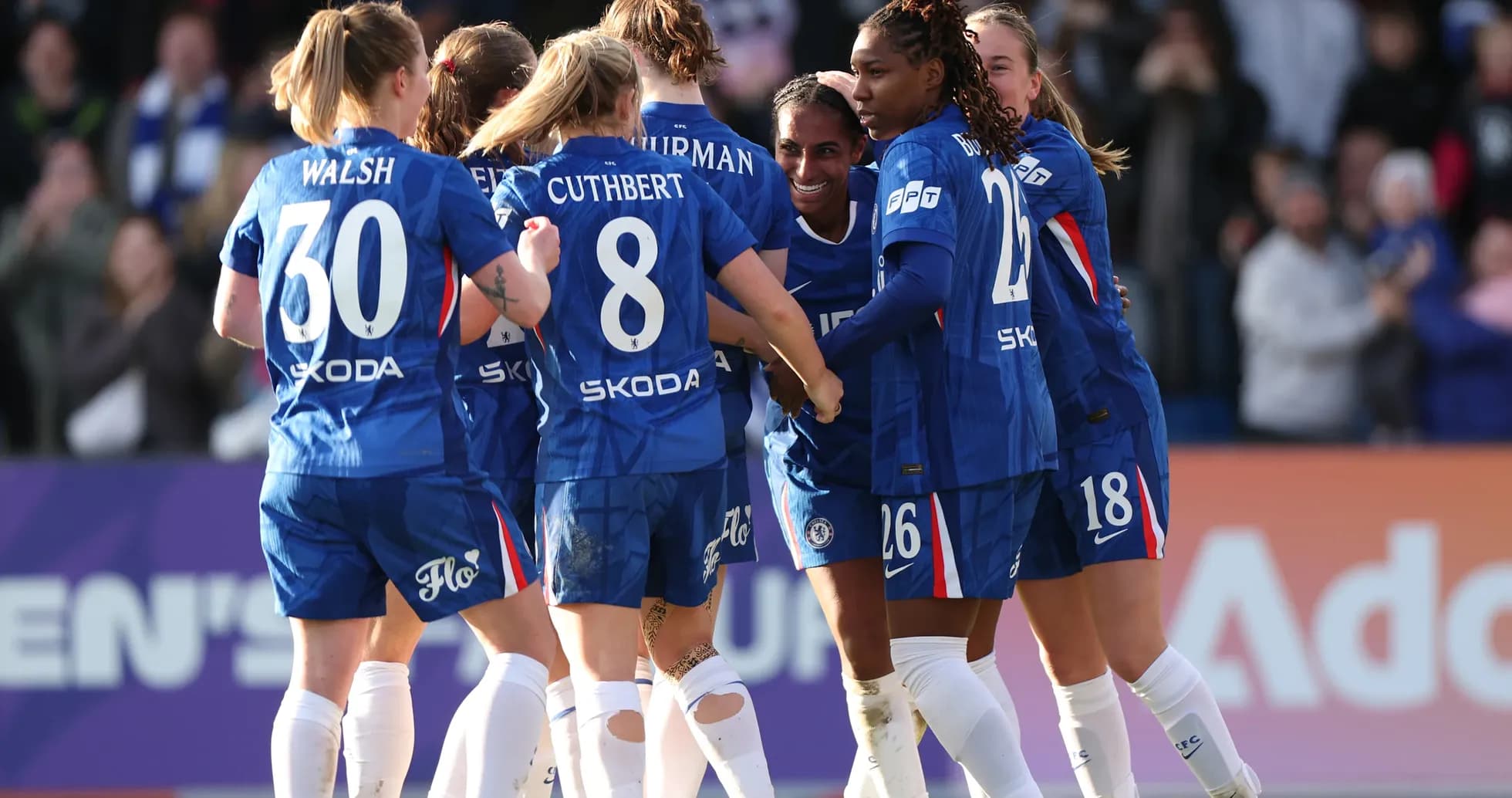 Chelsea W players celebrating a goal Chelsea W players celebrating a goal