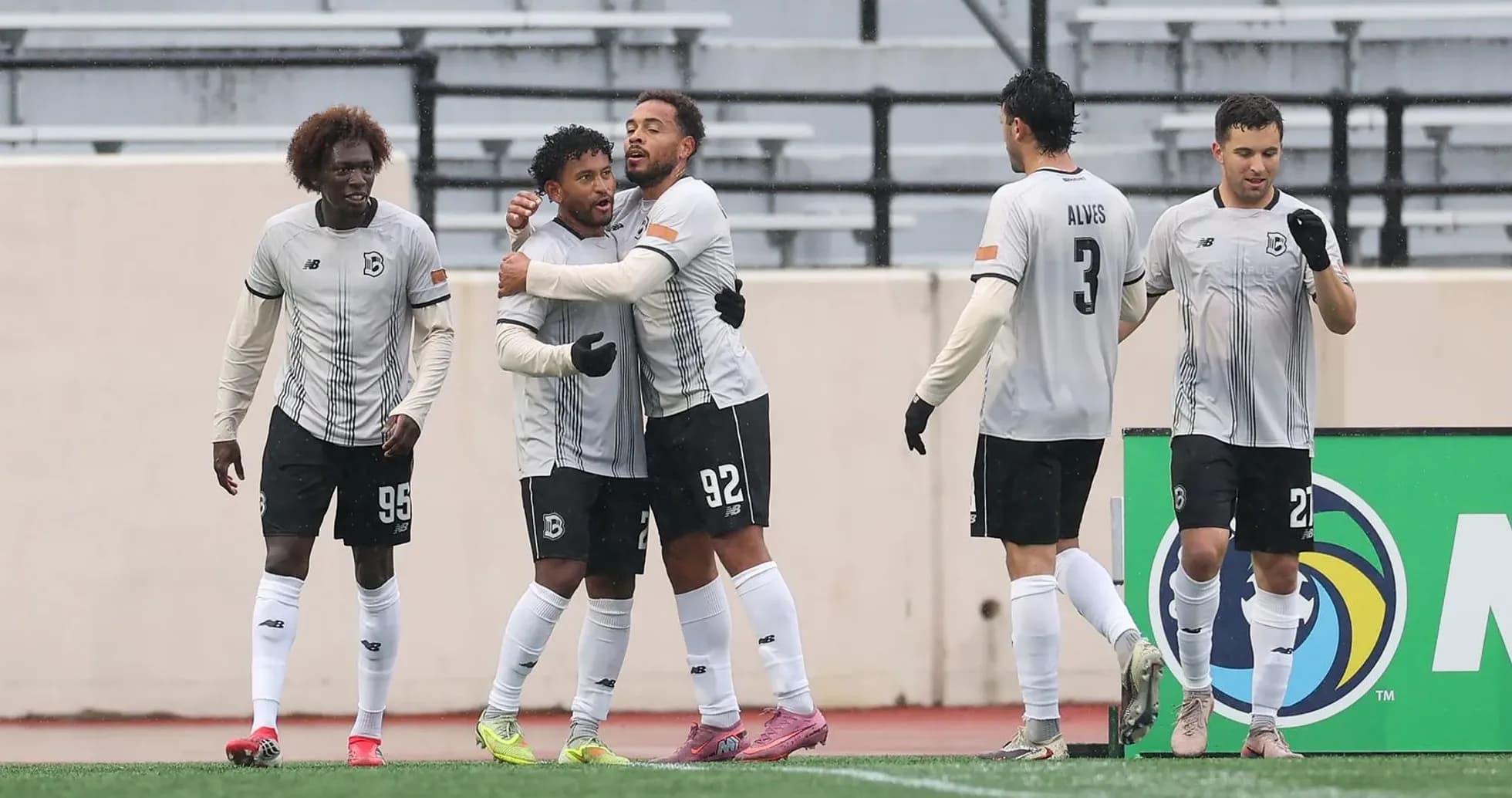 Players celebrating a goal during USL match Players celebrating a goal during USL match