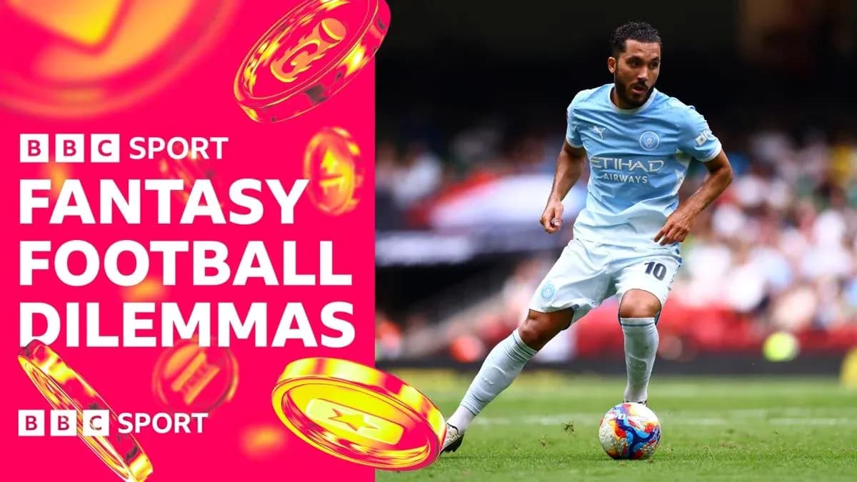 Player in light blue kit dribbling on the field Player in light blue kit dribbling on the field