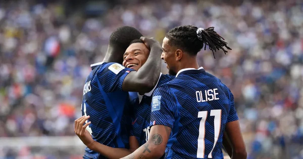 Three players celebrating a goal during match Three players celebrating a goal during match