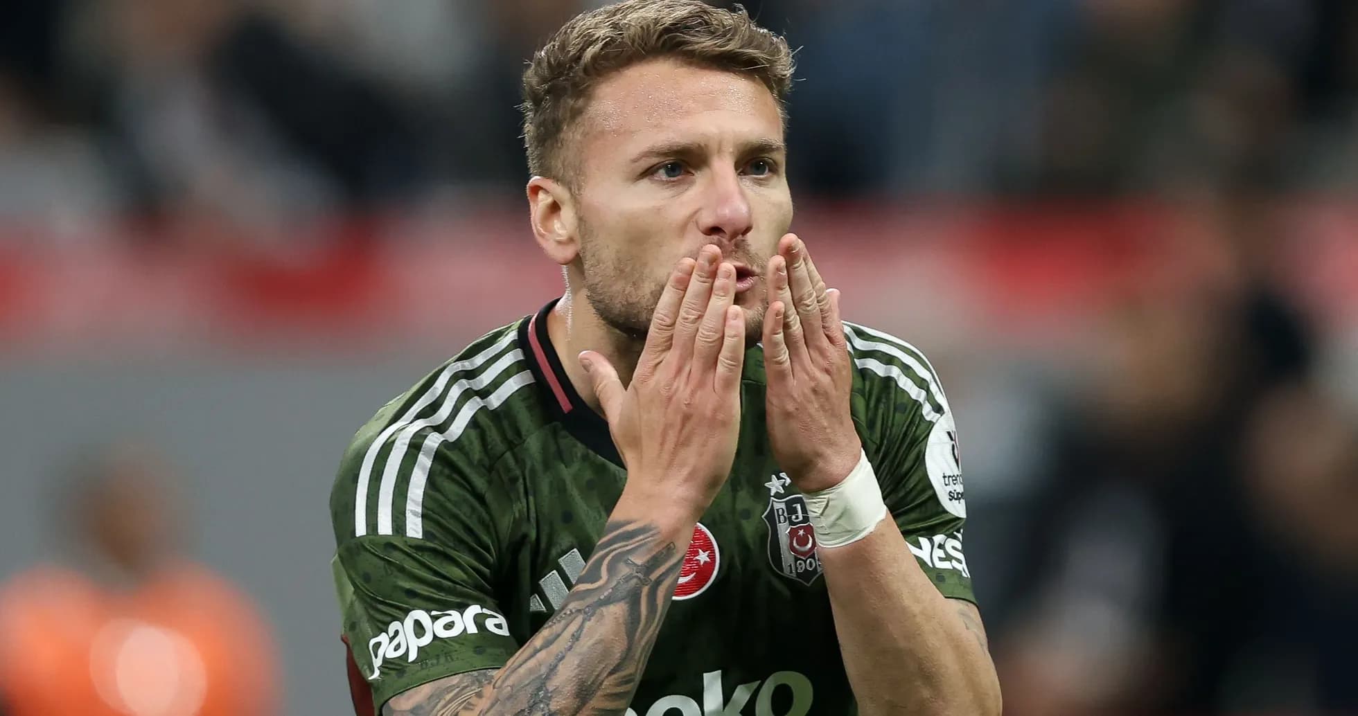 Player blowing kisses during match celebration Player blowing kisses during match celebration