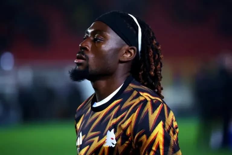 Player in colorful jersey during pre-match warm-up Player in colorful jersey during pre-match warm-up