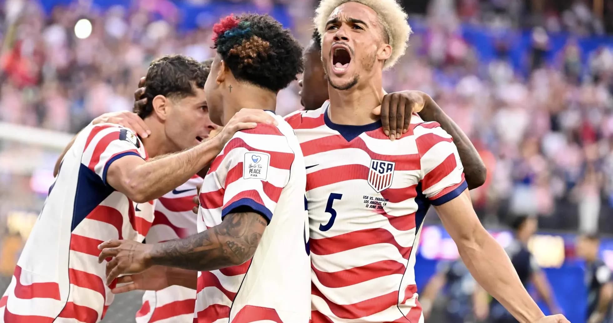 USA players celebrating a goal in World Cup match USA players celebrating a goal in World Cup match
