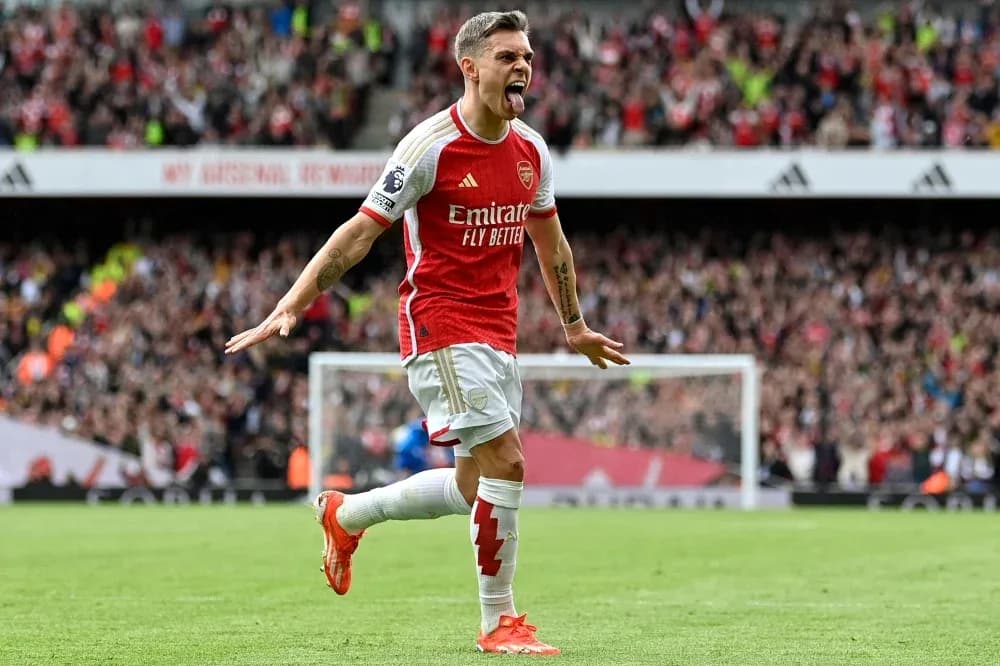 Player celebrating a goal at Emirates Stadium Player celebrating a goal at Emirates Stadium
