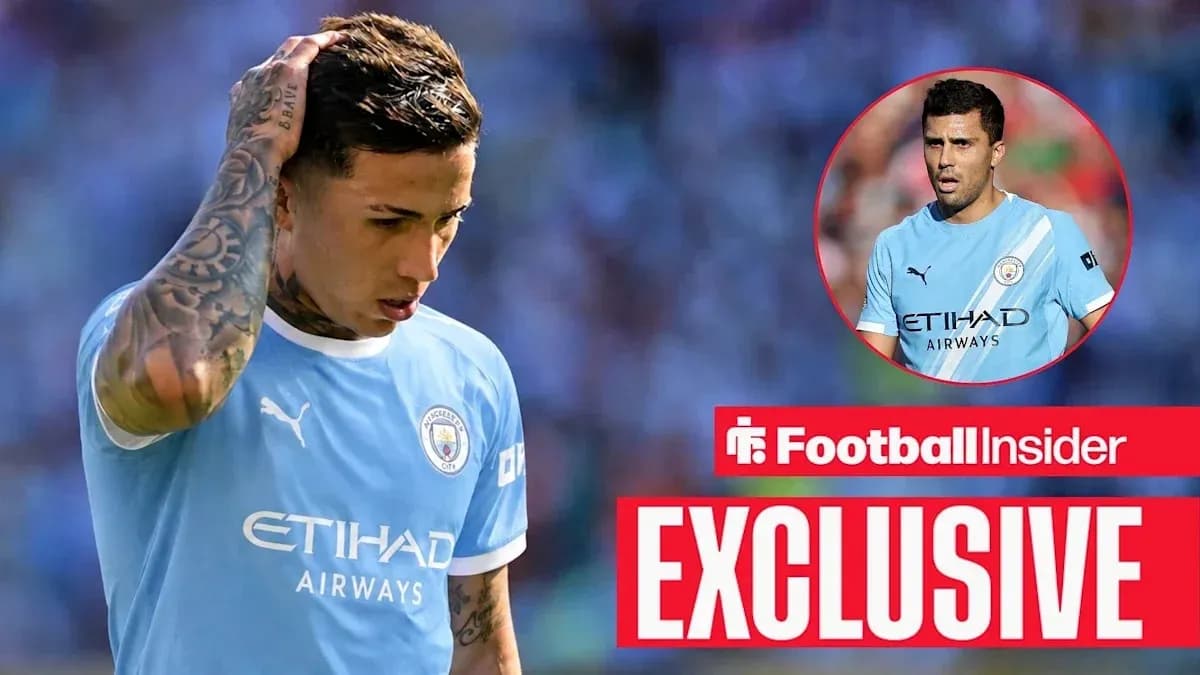 Player in Manchester City kit looking down on pitch Player in Manchester City kit looking down on pitch