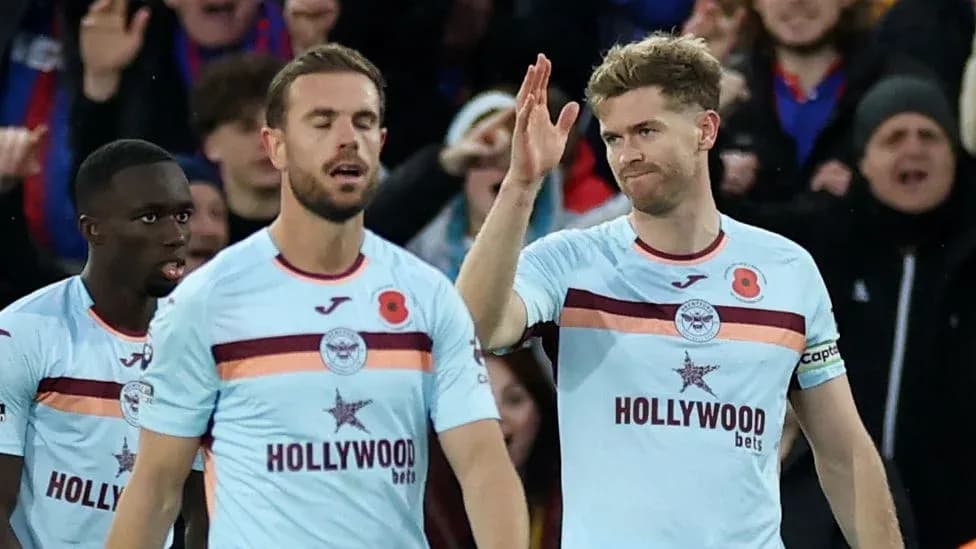 Players celebrating after scoring a goal during match Players celebrating after scoring a goal during match