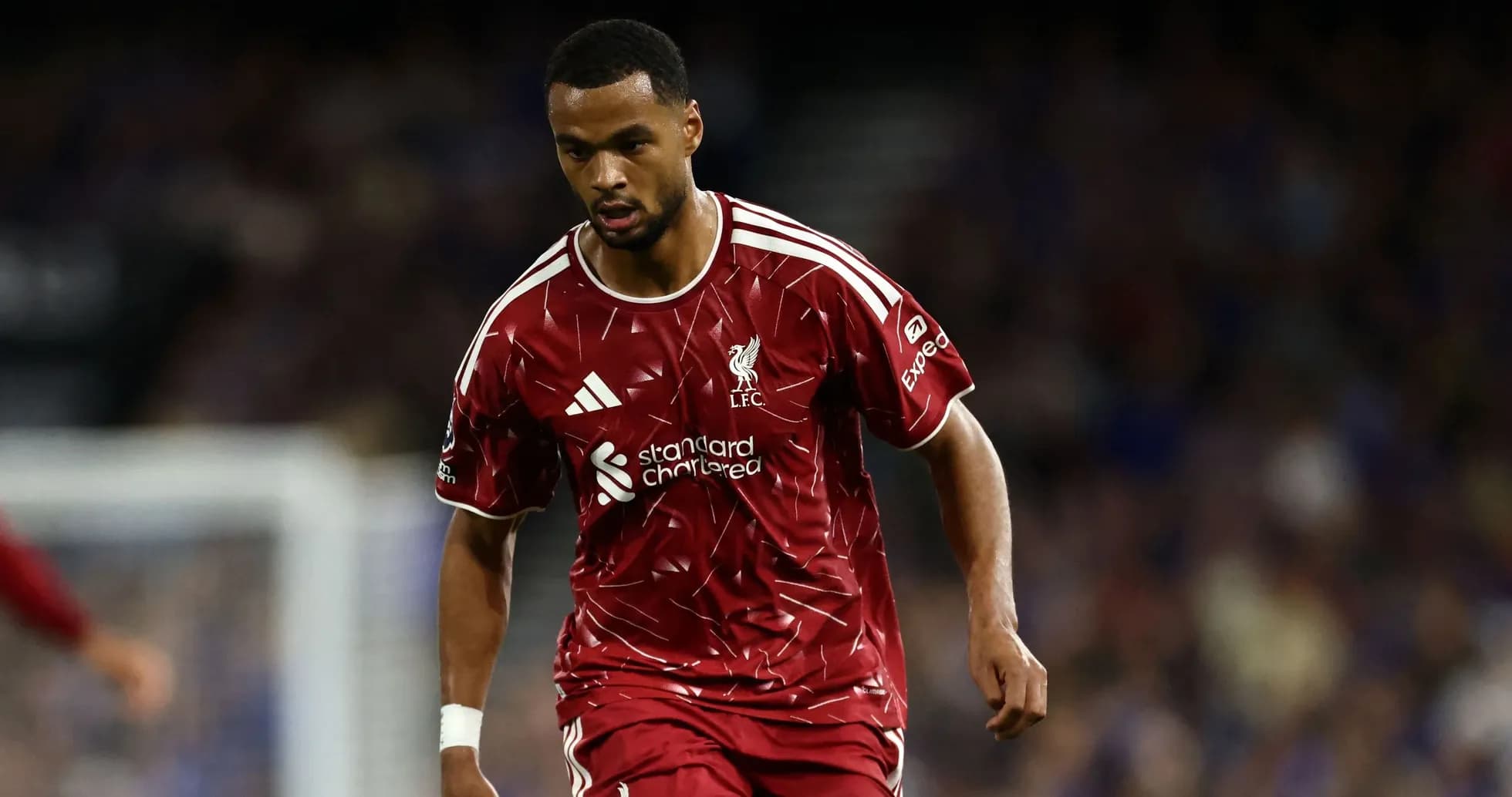 Player in red Liverpool kit during match action Player in red Liverpool kit during match action