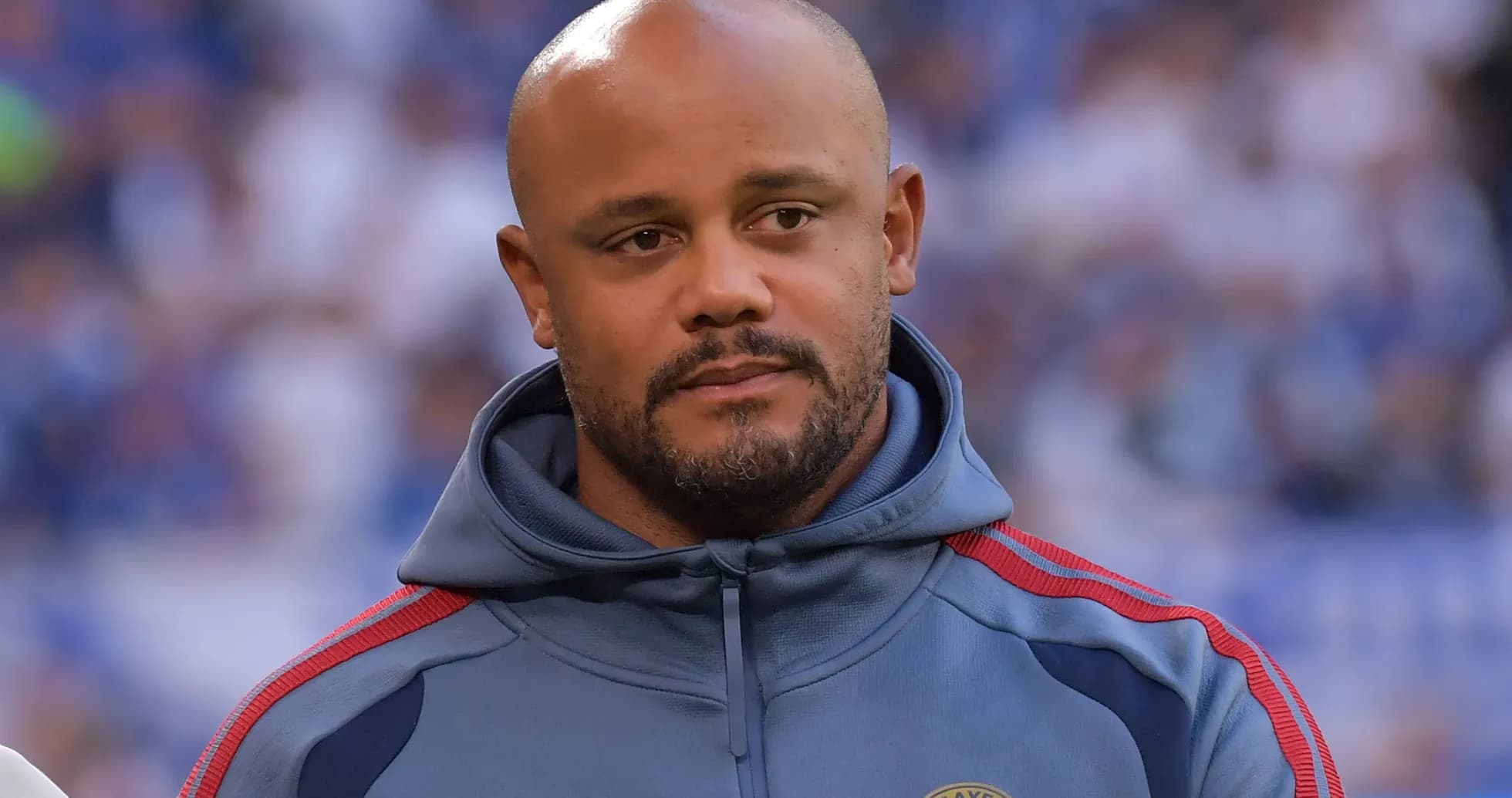 Coach wearing a team hoodie before the match Coach wearing a team hoodie before the match